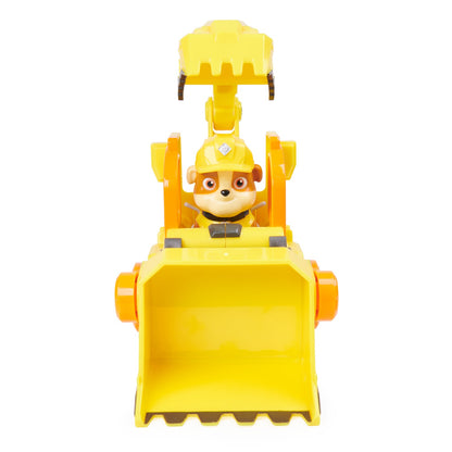 Front view of Rubble in his yellow bulldozer with raised excavator arm