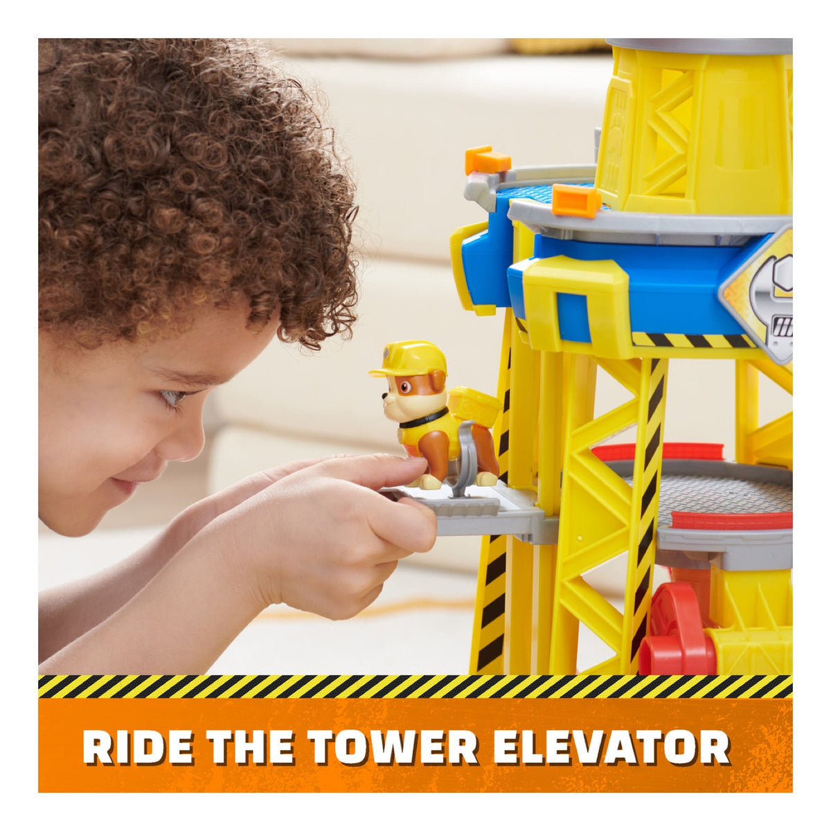 Child placing Rubble on the Bark Yard Crane Tower lift