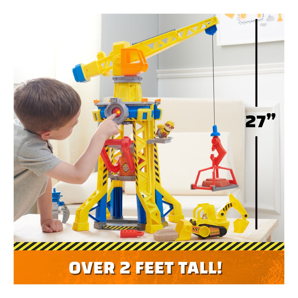 Child playing with the 27-inch Bark Yard Crane Tower playset