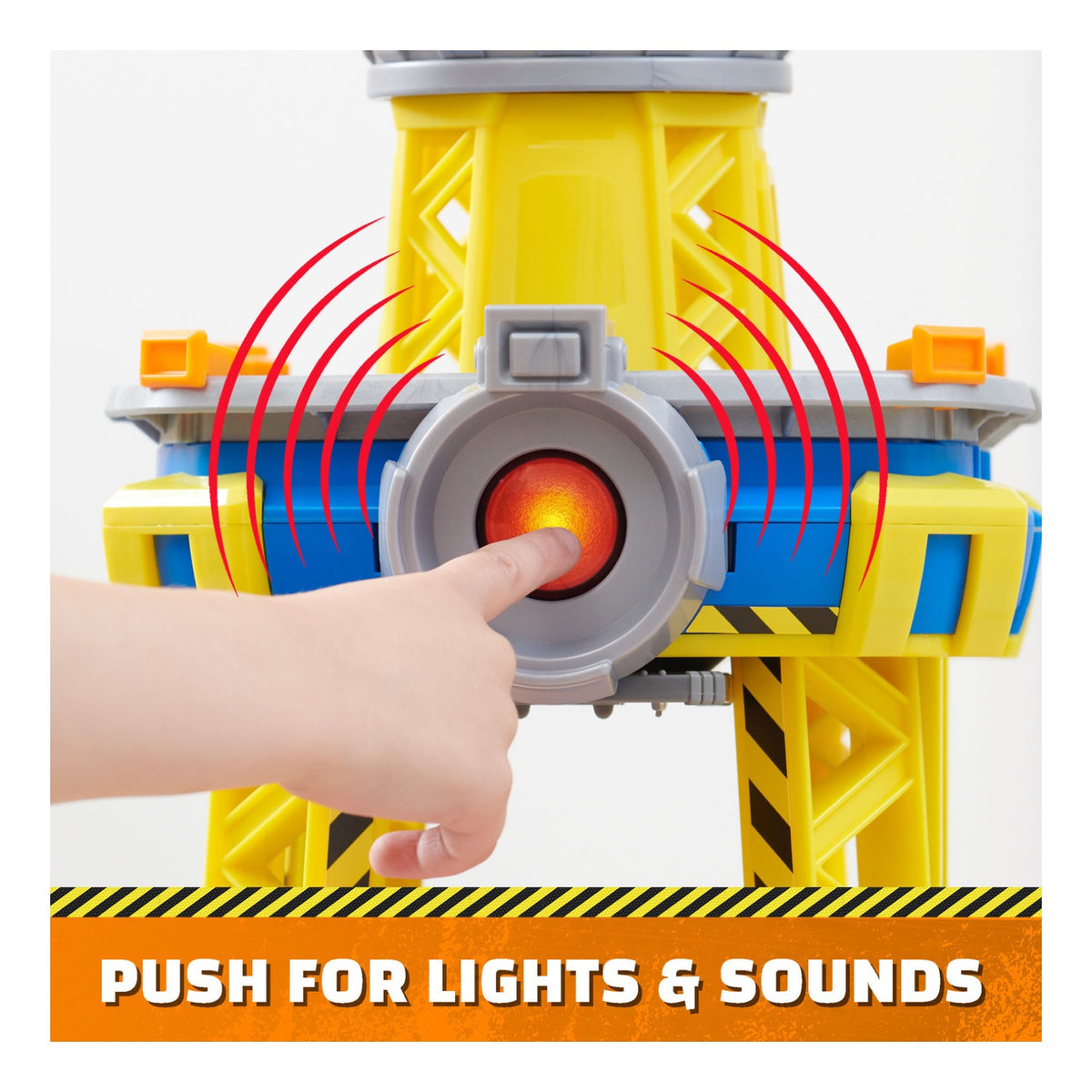Child pressing the Bark Yard Crane Tower lights and sounds button