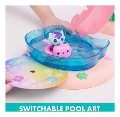 MerCat in the pool beside the switchable illustrated pool insert