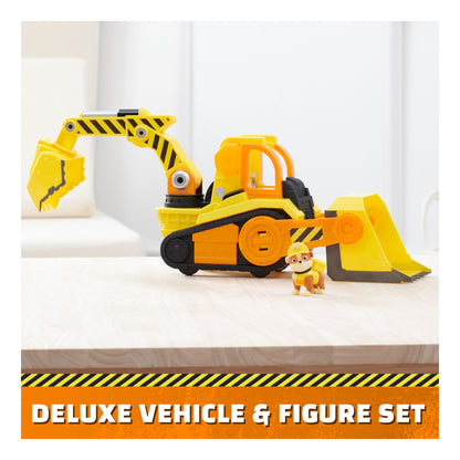 Rubble’s deluxe yellow bulldozer and Rubble figure displayed from the side