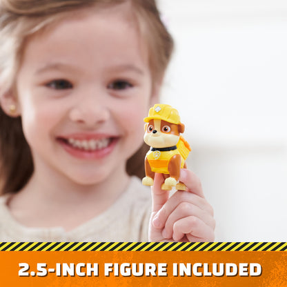 Child holding the included 2.5-inch Rubble figure