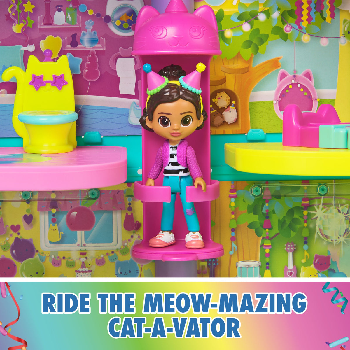 Gabby figure riding the pink cat-a-vator inside the dollhouse