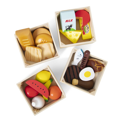 Four wooden crates filled with assorted wooden food group pieces