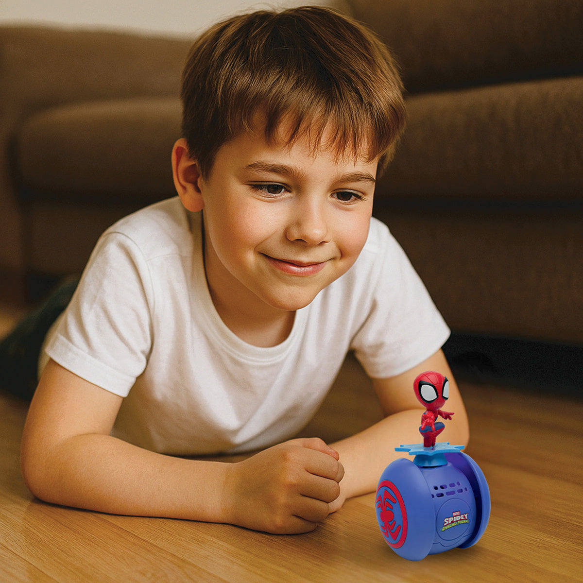 Boy watching the Spider-Man My Sliding Buddy robot move